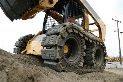 tires vs tracks skid steer|aggressive skid steer tracks.